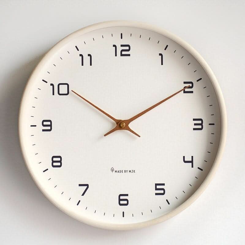 Minimalist slim beige frame wall clock, modern quiet design, clean lines for contemporary living rooms