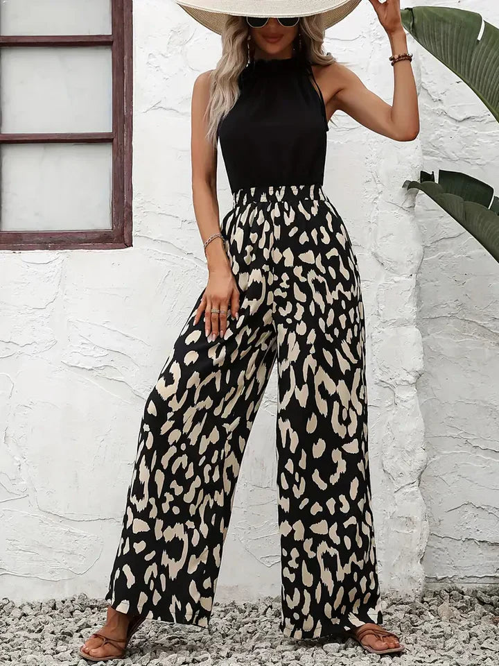 Women's high waisted wide leg animal print pants with elastic waistband, versatile party wear