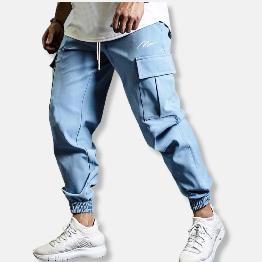 Men's relaxed fit cargo jogger pants with elastic waist, side pockets, and ankle-length silhouette