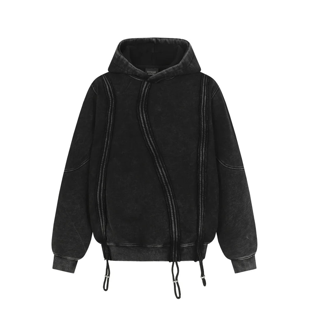 Loose fit garment-dyed cotton hoodie with visible seams and drawstring hem for streetwear