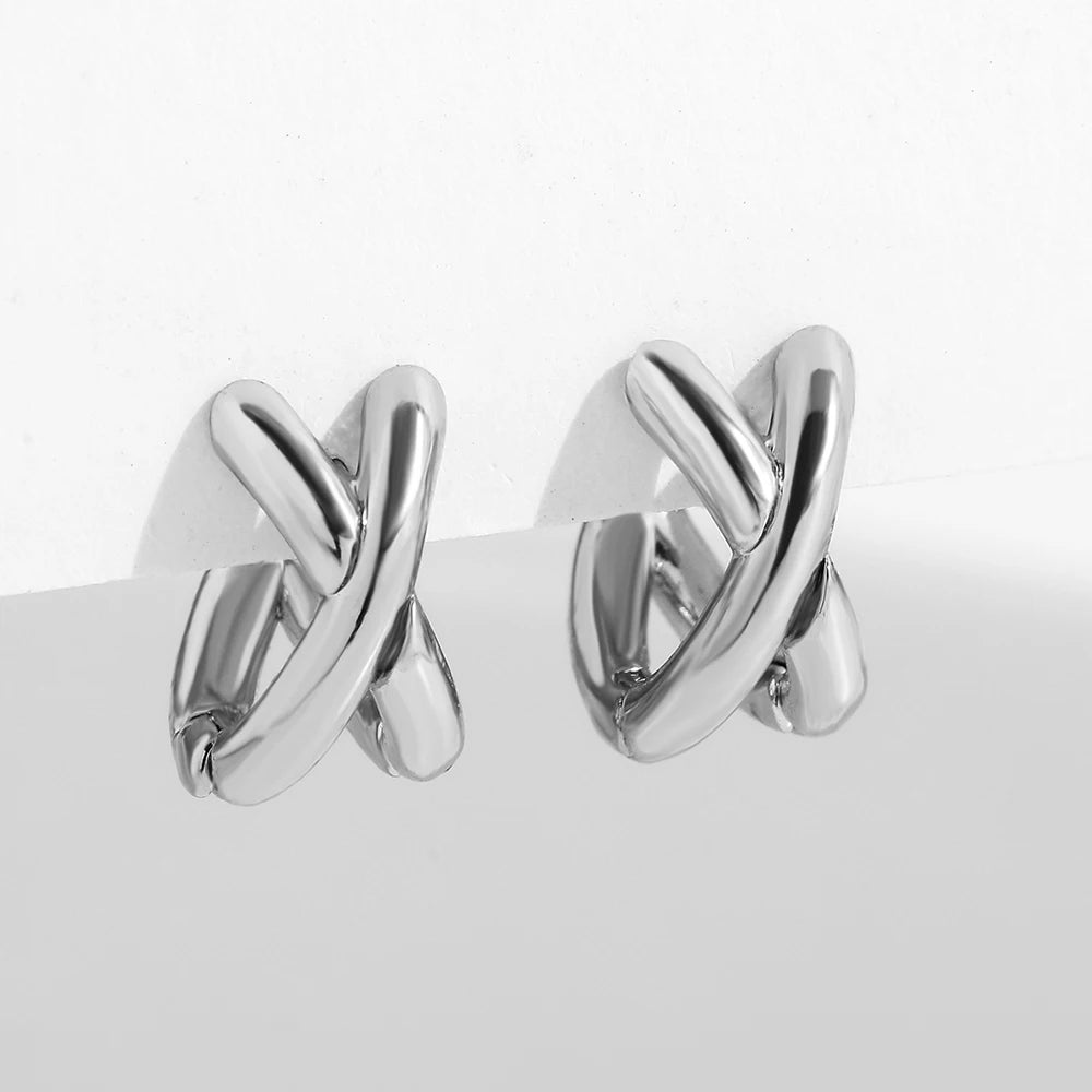 Xyla bold architectural double-band crossover hoop earrings high-polish finish modern minimalist huggies