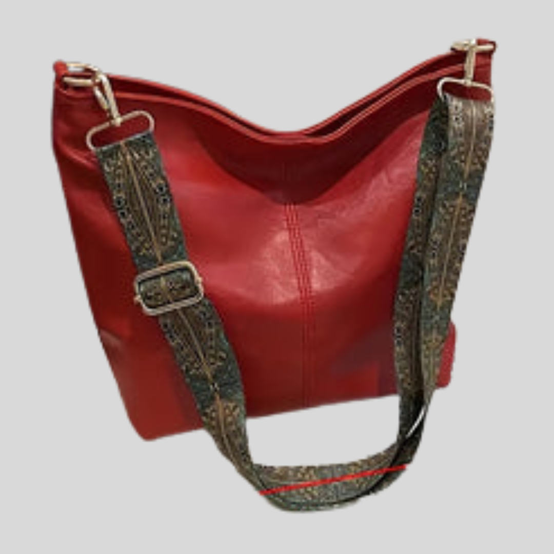 Women's everyday shoulder bag with wide adjustable strap, large interior pocket, versatile casual style