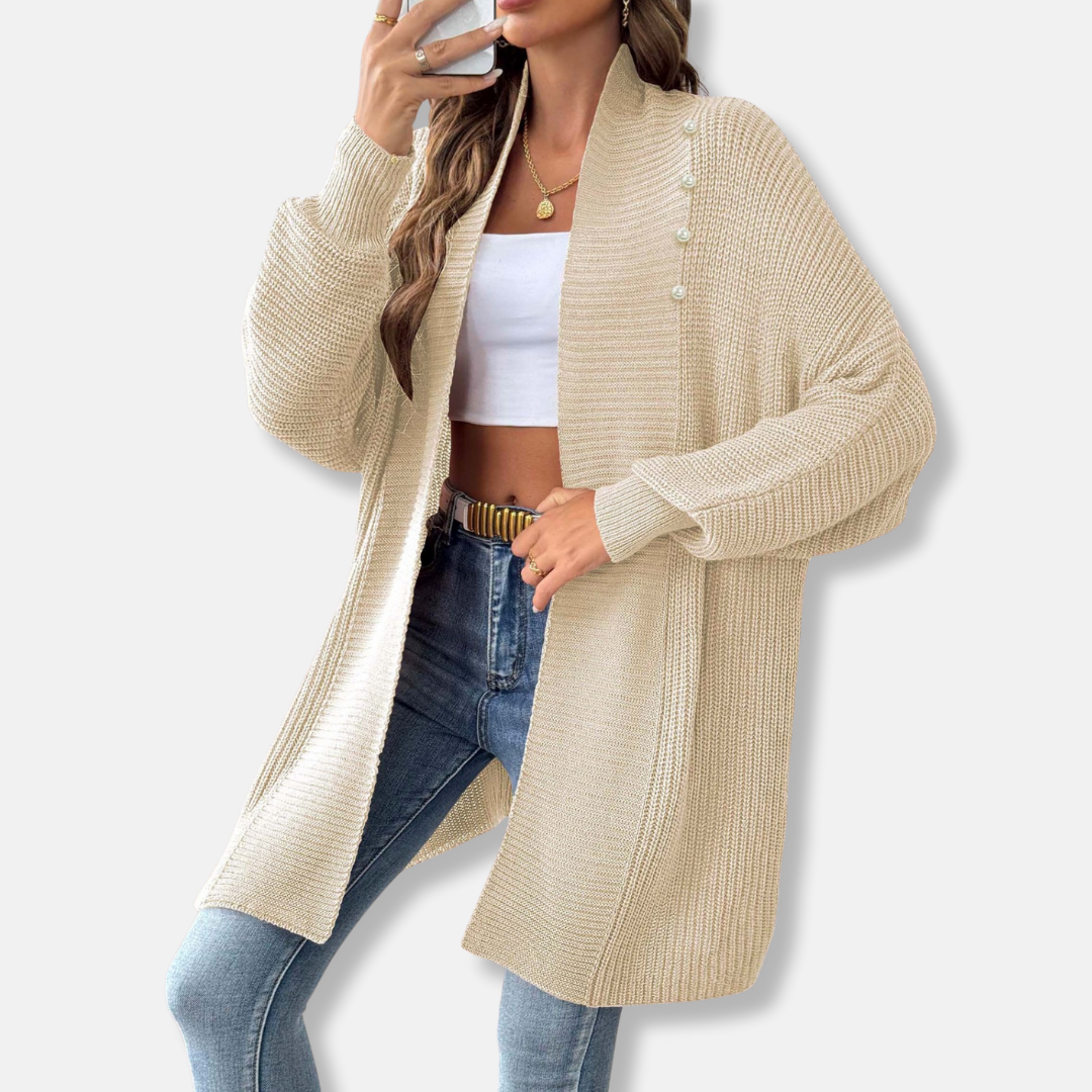 Women's longline acrylic knit cardigan with shawl collar and pearl button detailing, smart casual style