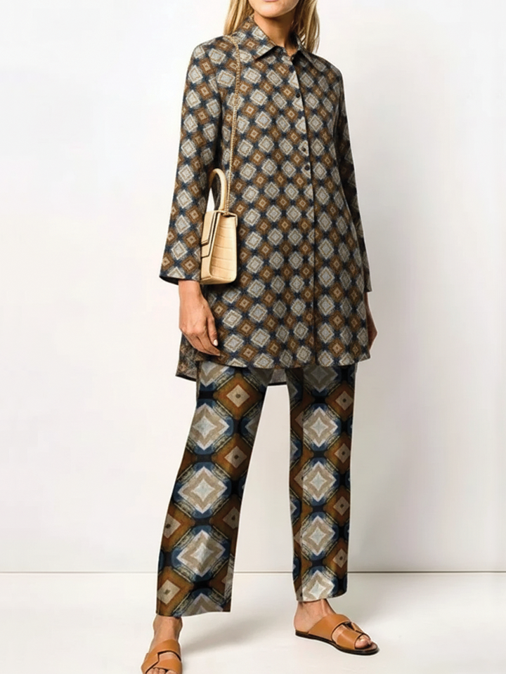 Women's two-piece woven set with relaxed tunic top, straight-leg pants, and pointed collar detail