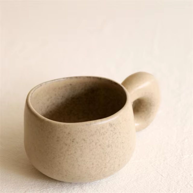 Terra ceramic mug handcrafted speckled finish ergonomic grip rustic modern design for tea lovers