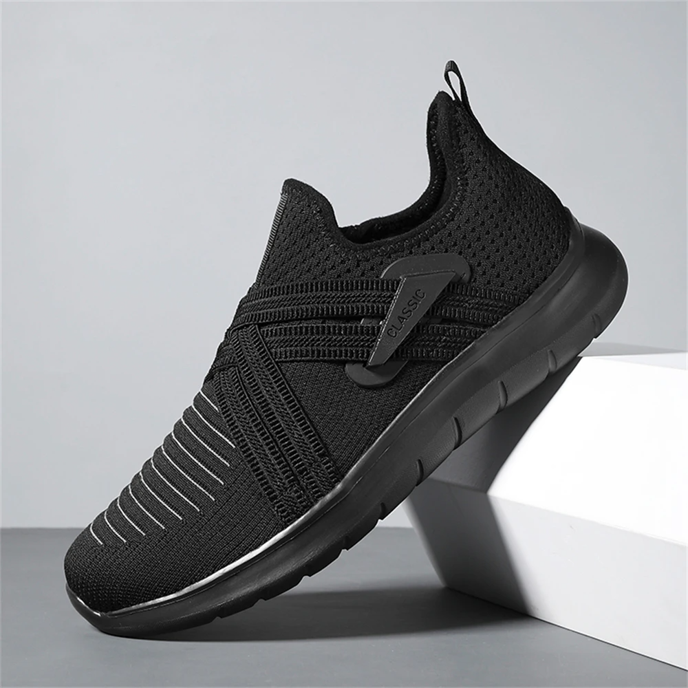 Gray slip-on walking sneakers with shock-absorbing sole, wide toe box, and lightweight cushioned design