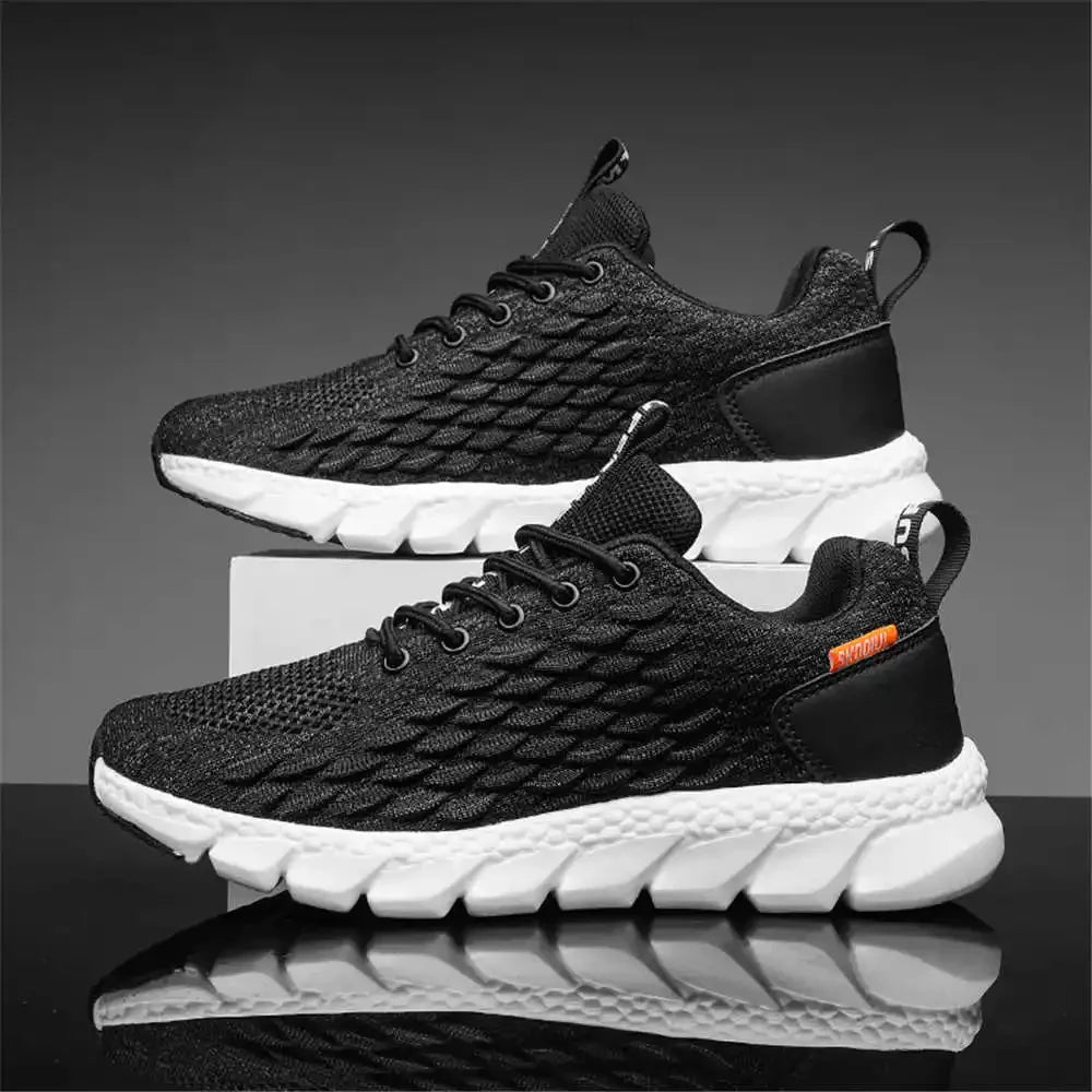 White and gray fly-knit performance sneaker with cushioned insole and honeycomb breathable mesh upper