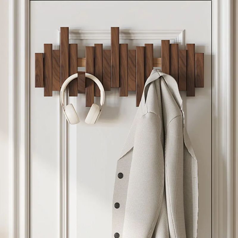 Kynna natural solid wood coat rack with foldable hooks, minimalist design for small spaces