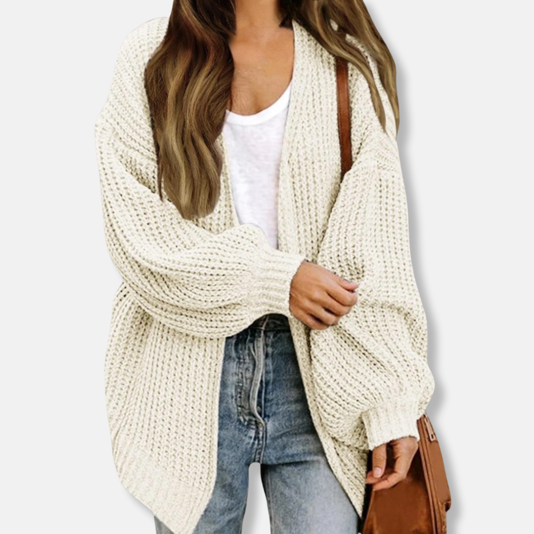 Women's oversized knit cardigan with voluminous lantern sleeves and ribbed cuffs for chic fall layering