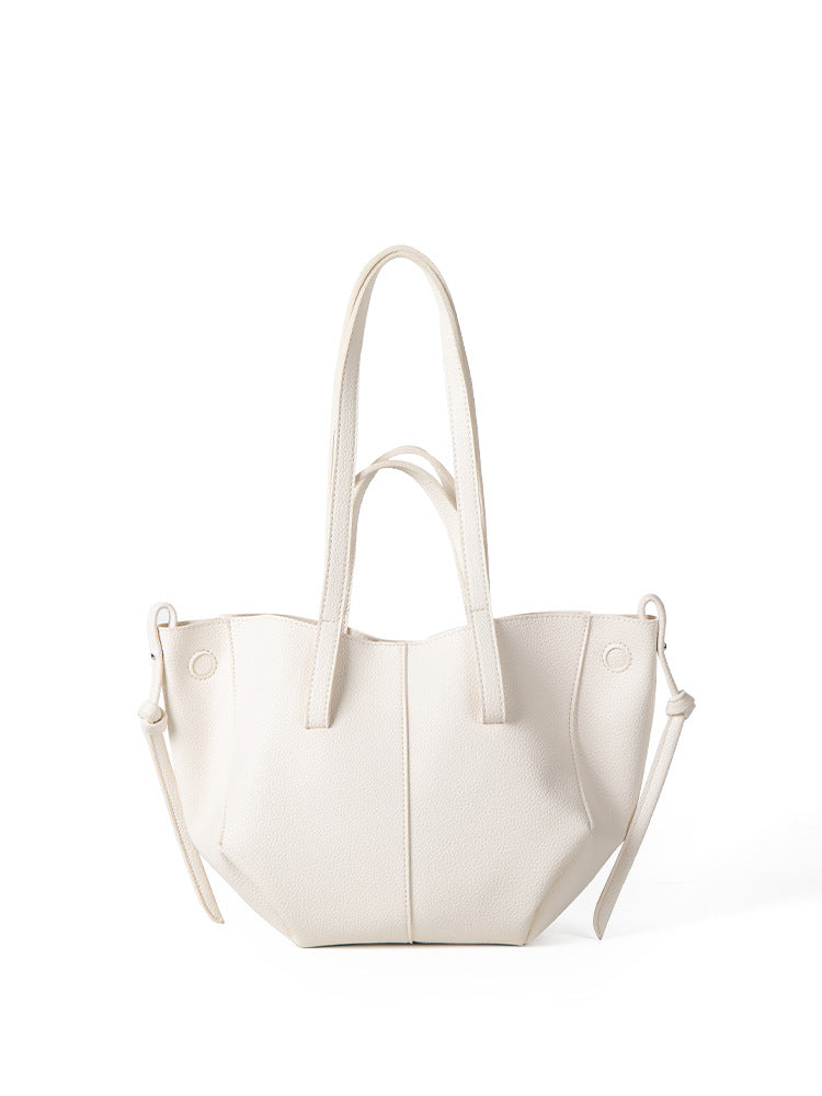 Women's vintage structured tote bag in pebbled finish with dual handles and adjustable shoulder strap