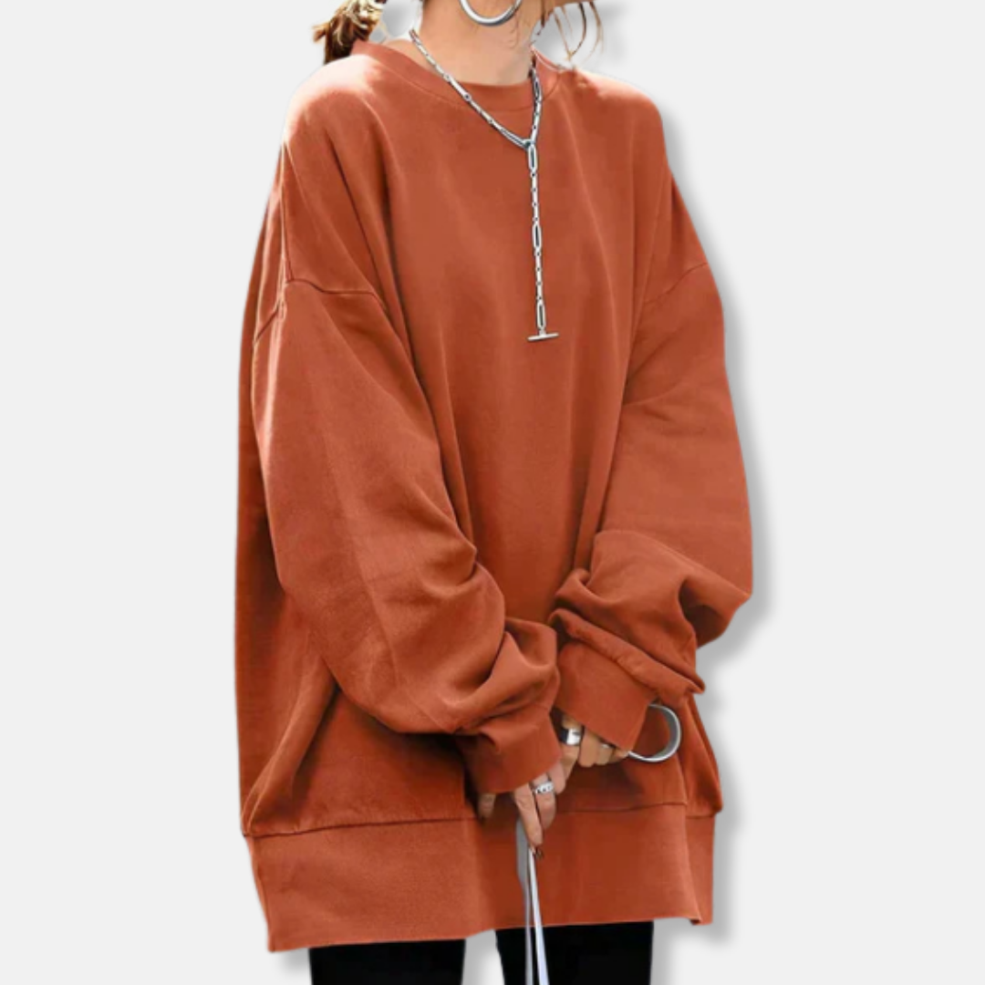 Women's soft knit oversized tunic-length sweatshirt in neutral tones for effortless casual layering