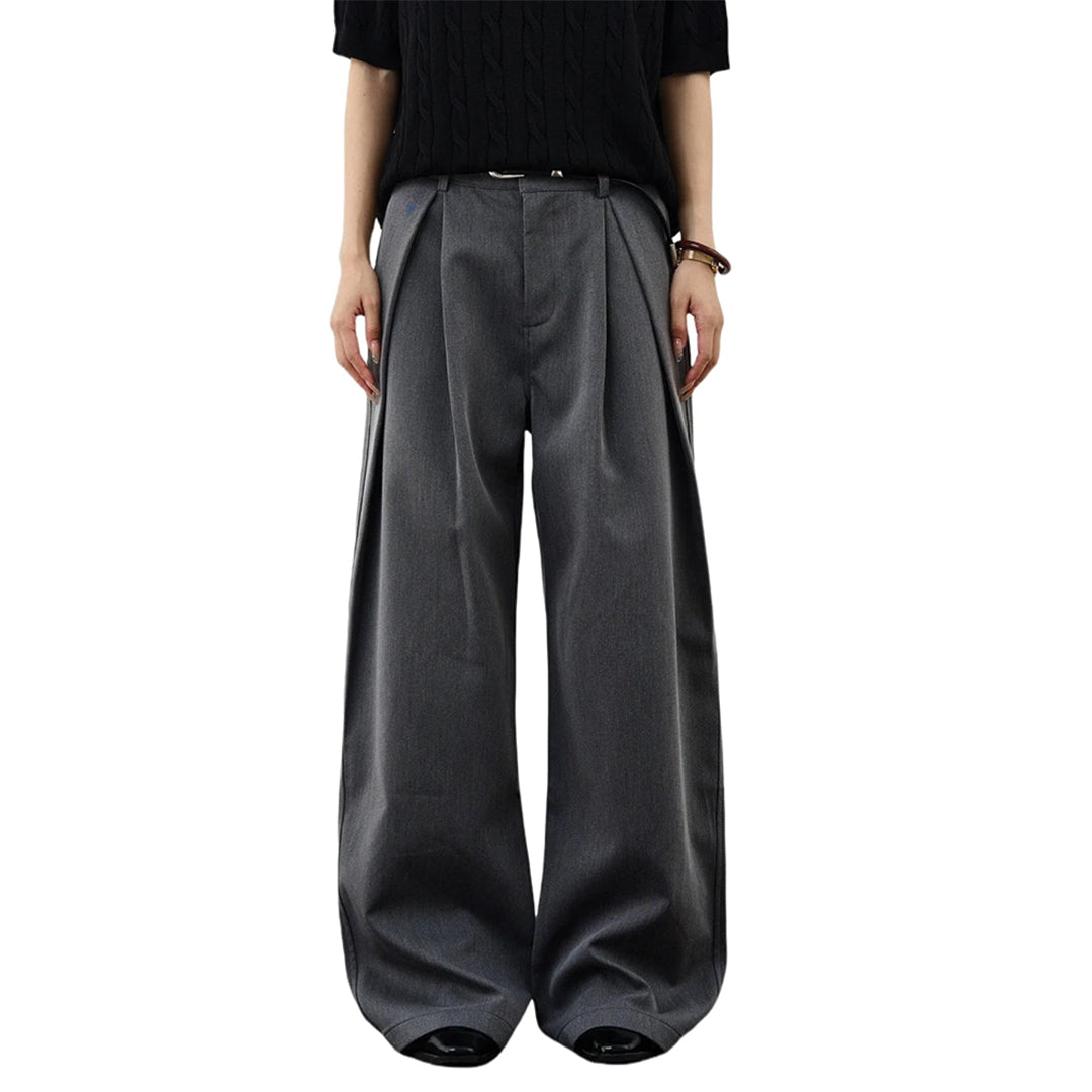 Wide-leg pleated trousers relaxed drape structured silhouette viscose blend modern women