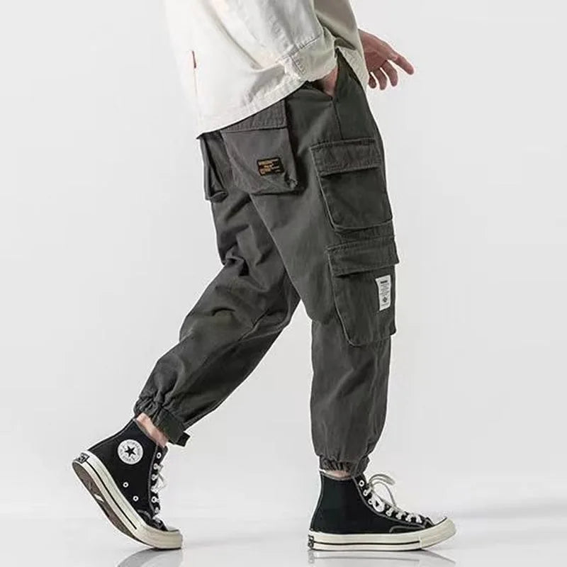 Men's tapered cargo pants heavyweight cotton olive green oversized flap pockets drawcord waist
