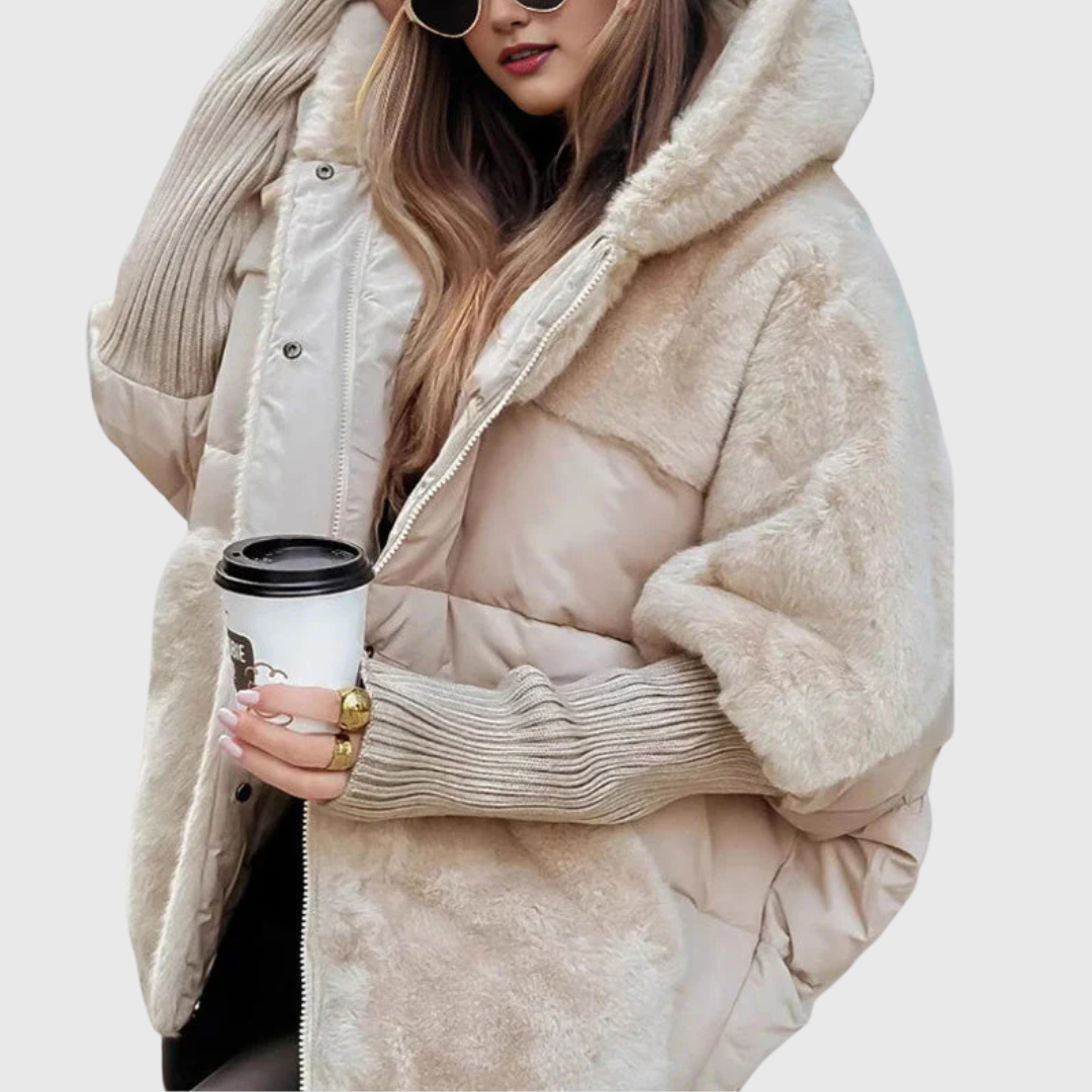 Women's black oversized faux fur puffer jacket with hood and contrast ribbed sleeves