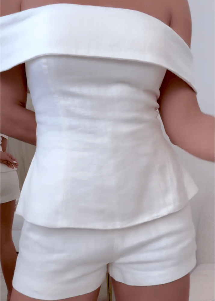 Women's white cotton blend two-piece suit with cropped button top and zipper closure tailored pants