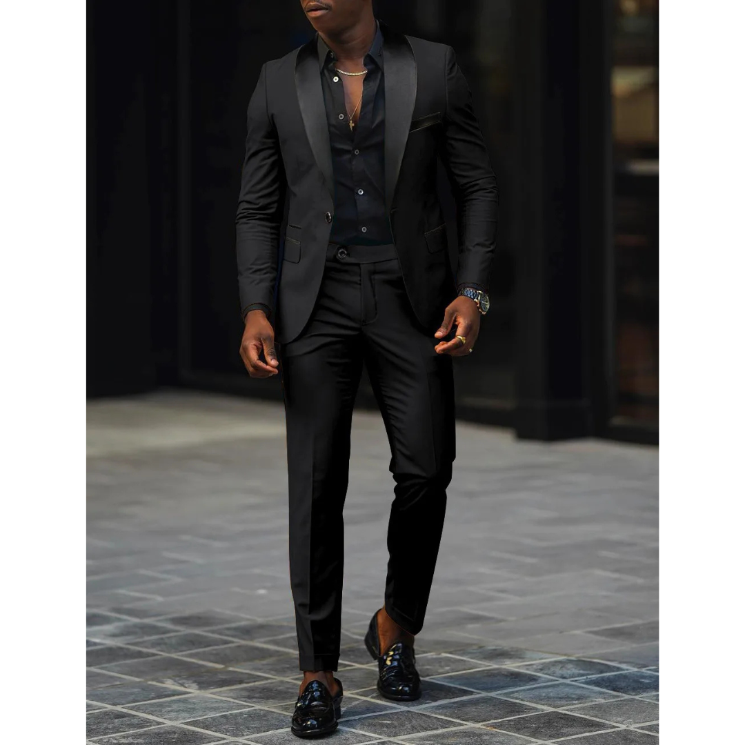 Men's slim fit black tuxedo suit with satin lapels, structured blazer and matching trousers for weddings
