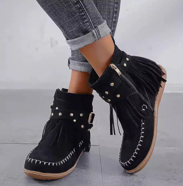 Women's brown faux suede fringe ankle boots with warm lining and side zip closure