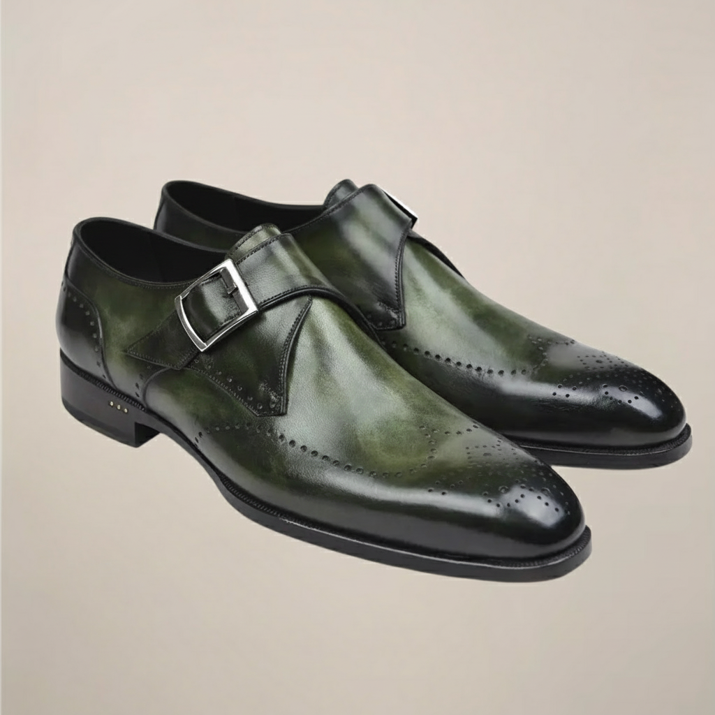 Men's rich brown monk strap dress shoes with single polished buckle and perforated toe detailing
