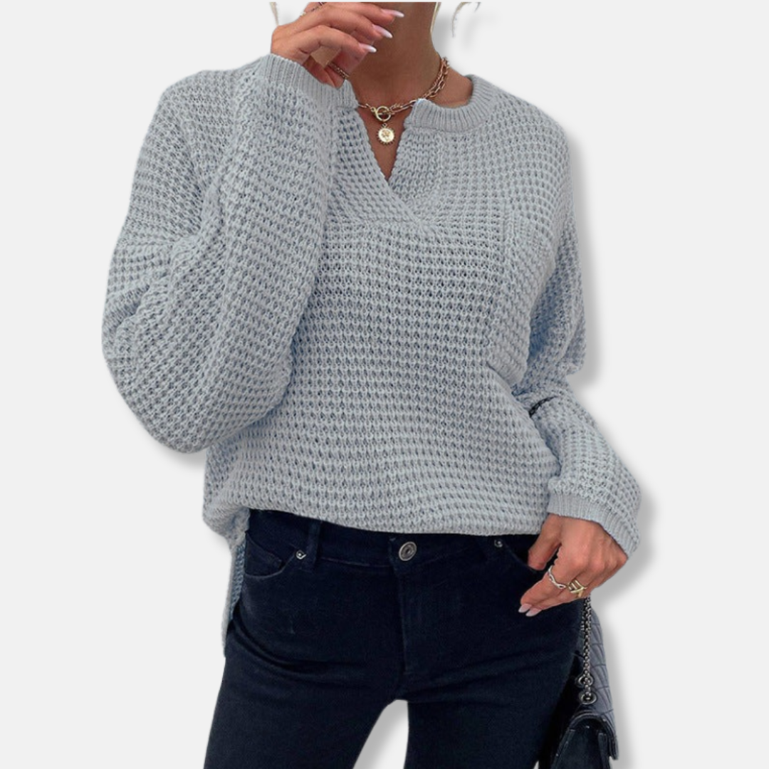 Women's relaxed-fit waffle knit sweater with notched round neck and long cuffed sleeves, cozy cotton blend