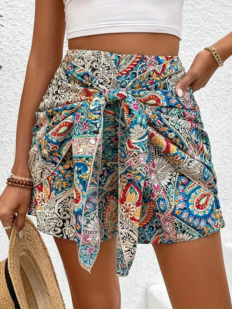 Bohemian paisley tie-waist shorts with sculptural wrap-skirt front detail in lightweight cotton blend
