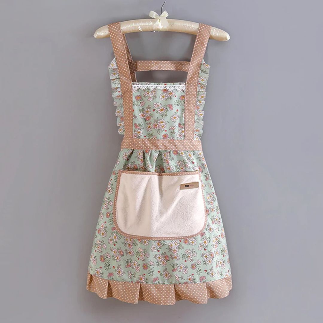 Vintage floral cotton apron with ruffle trim, polka dot accents, feminine style for home cooks