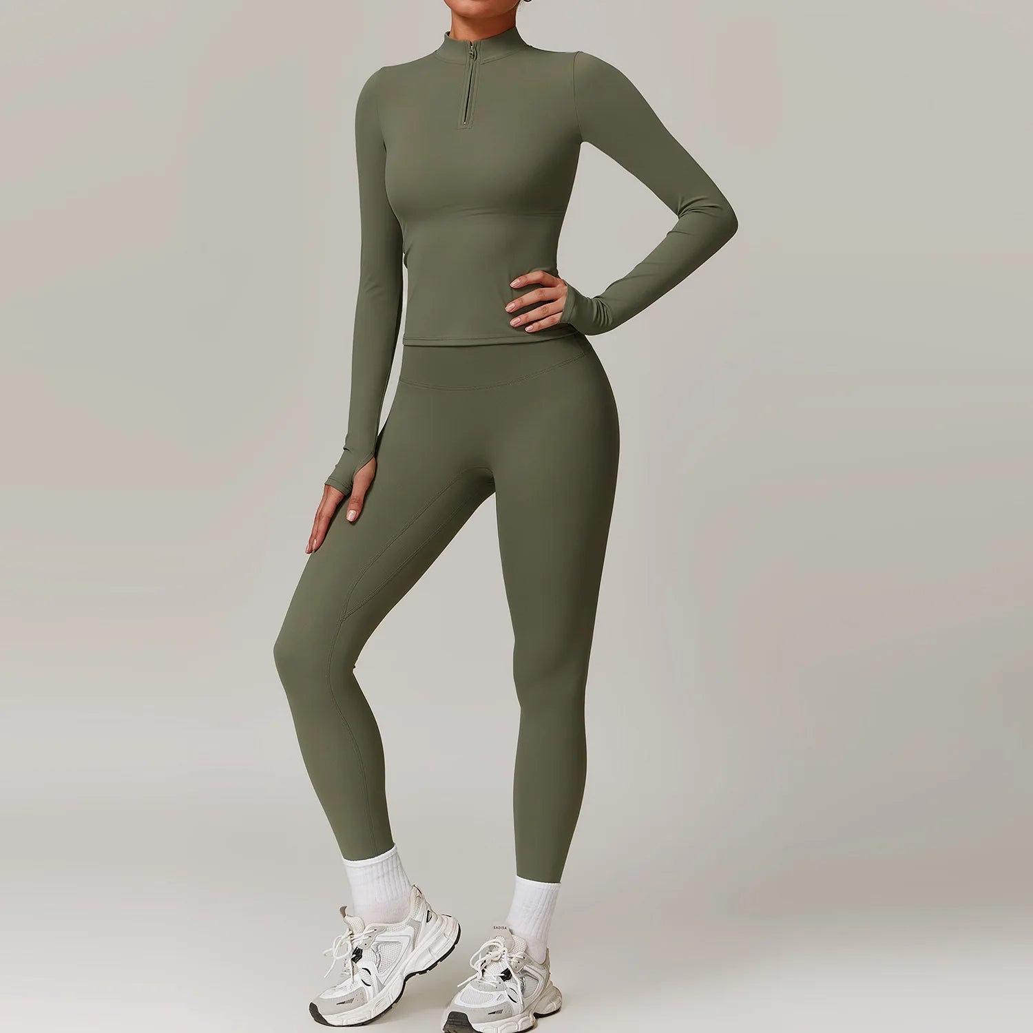 Women's seamless activewear set in neutral tones, sculpting fit with breathable spandex-nylon blend