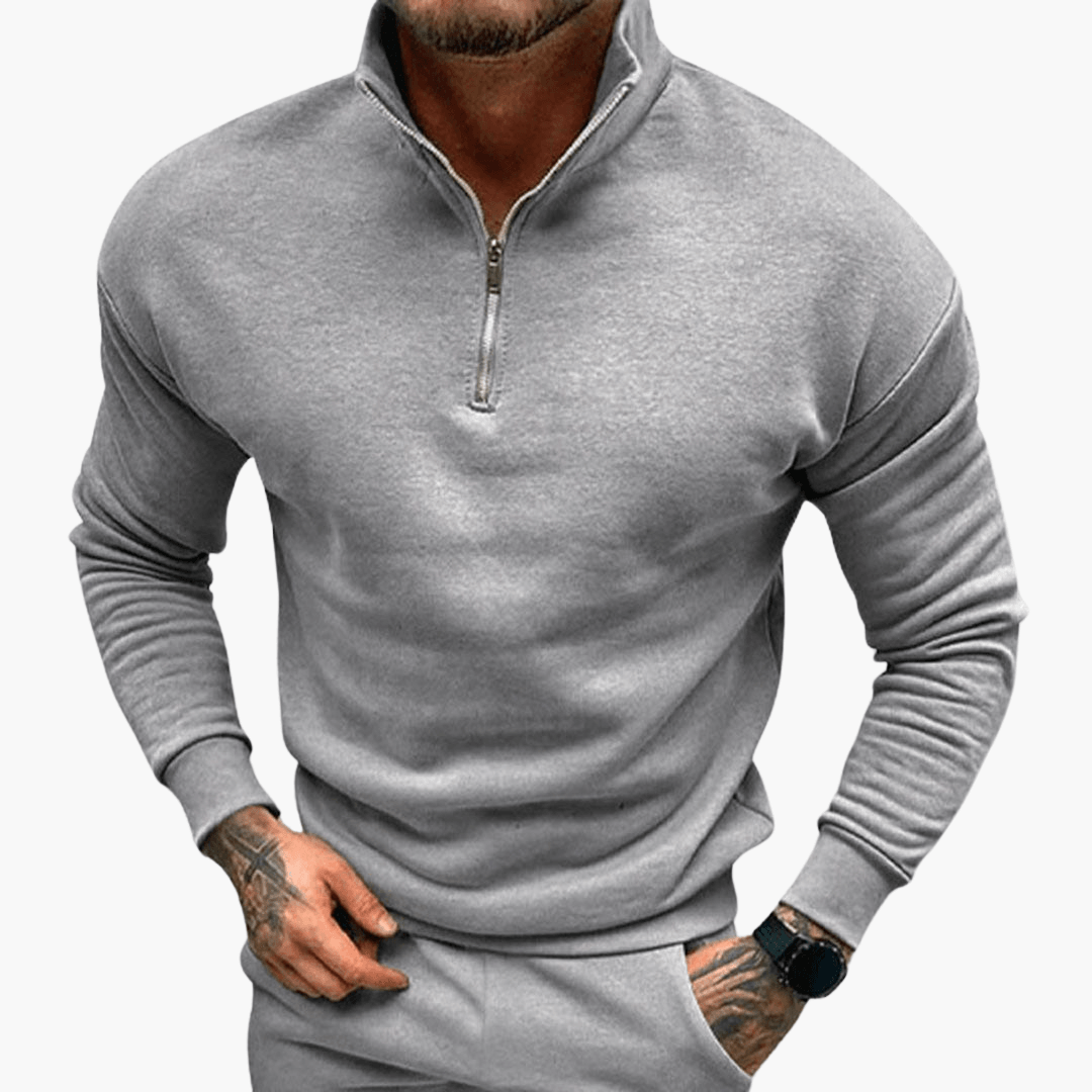 Men's slim fit half-zip sweatshirt in neutral tone, versatile everyday layering piece for travel and home