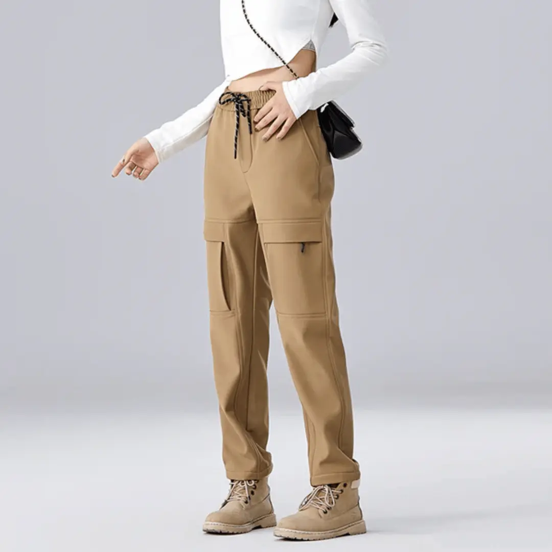 Men's weatherproof cargo pants with fleece lining, water-repellent shell, and adjustable waistband for outdoor use