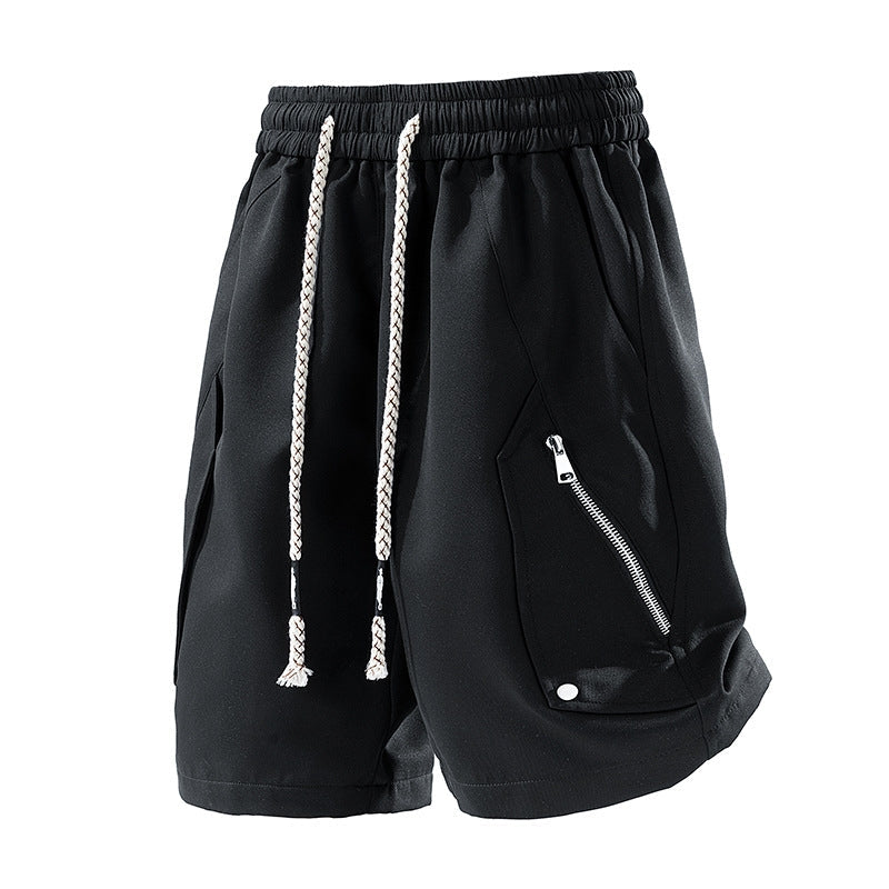 Unisex athletic shorts in breathable performance fabric with zip pockets and elastic waist for active wear