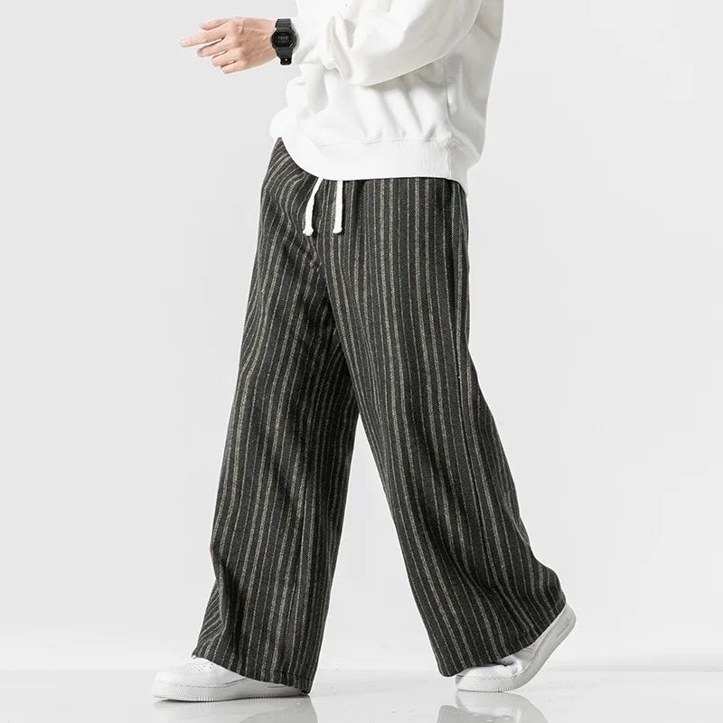Women's pinstripe wide-leg lounge pants with drawstring waist and deep pockets in heavyweight fabric