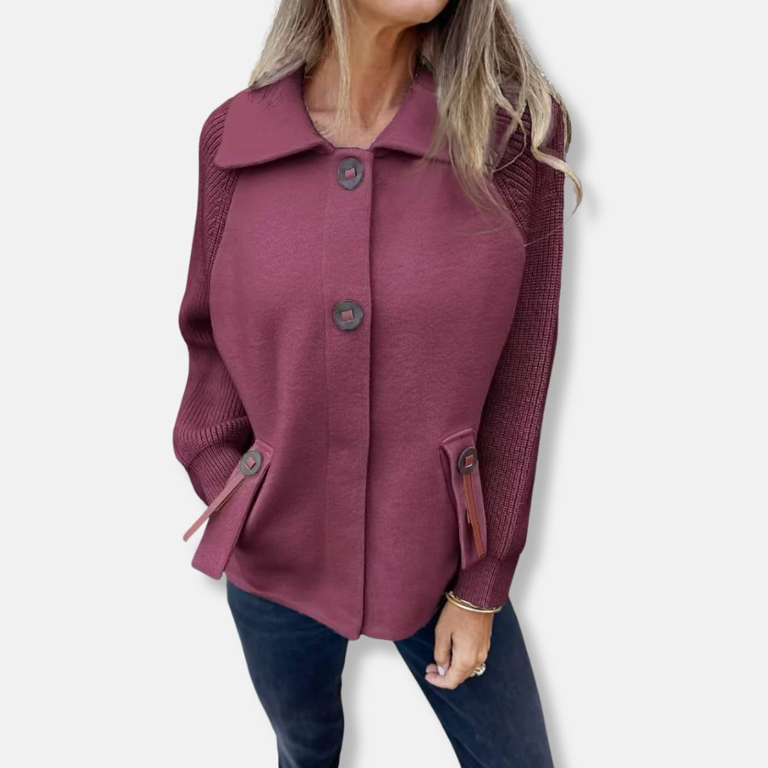 Women's relaxed fit jacket with textured knit sleeves, lapel collar, and button front closure
