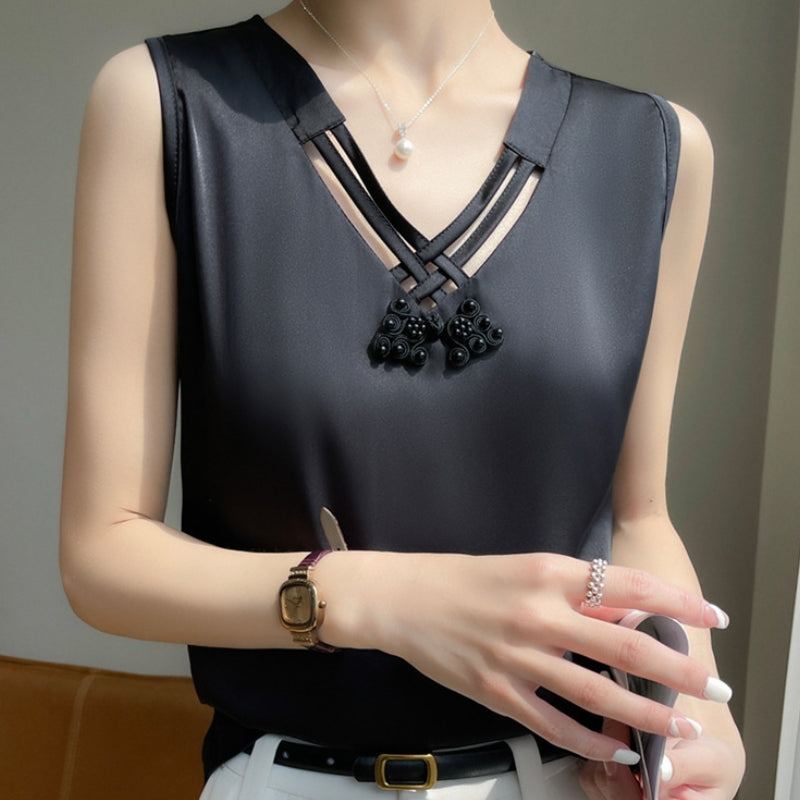 Women's ivory silk satin knot top with crisscross straps and pearl knot accent, lightweight slim fit