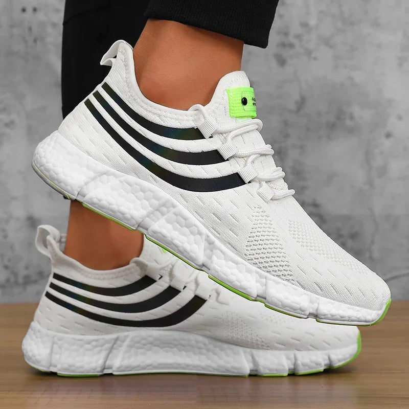 Ultralight white knit running sneaker with glove-like fit, sculpted sole, and energy-return cushioning