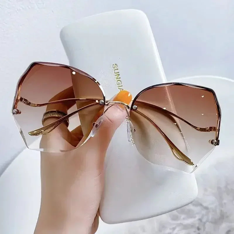 Women's rimless butterfly sunglasses gold temples gradient UV400 petal-cut lenses bold oversized frame