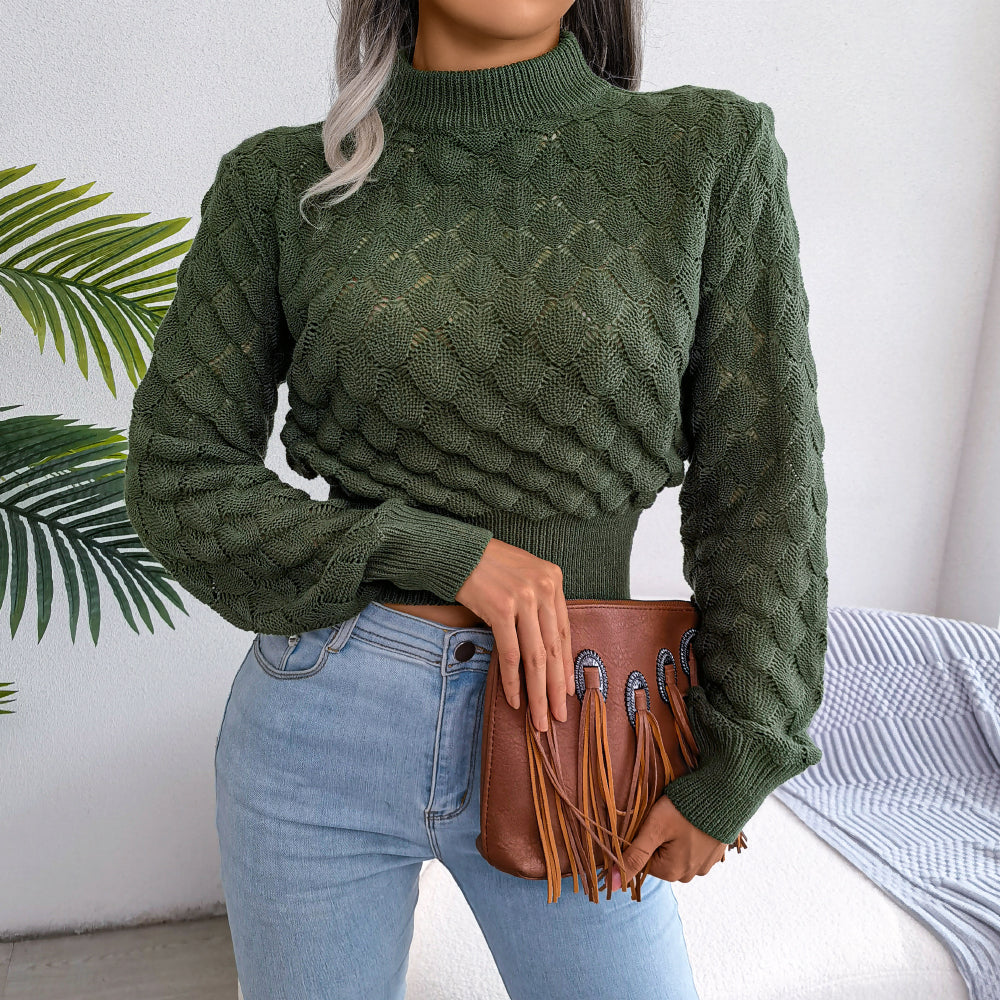 Women's textured knit top with circular 3D pattern, crossed high-neck design, flattering silhouette