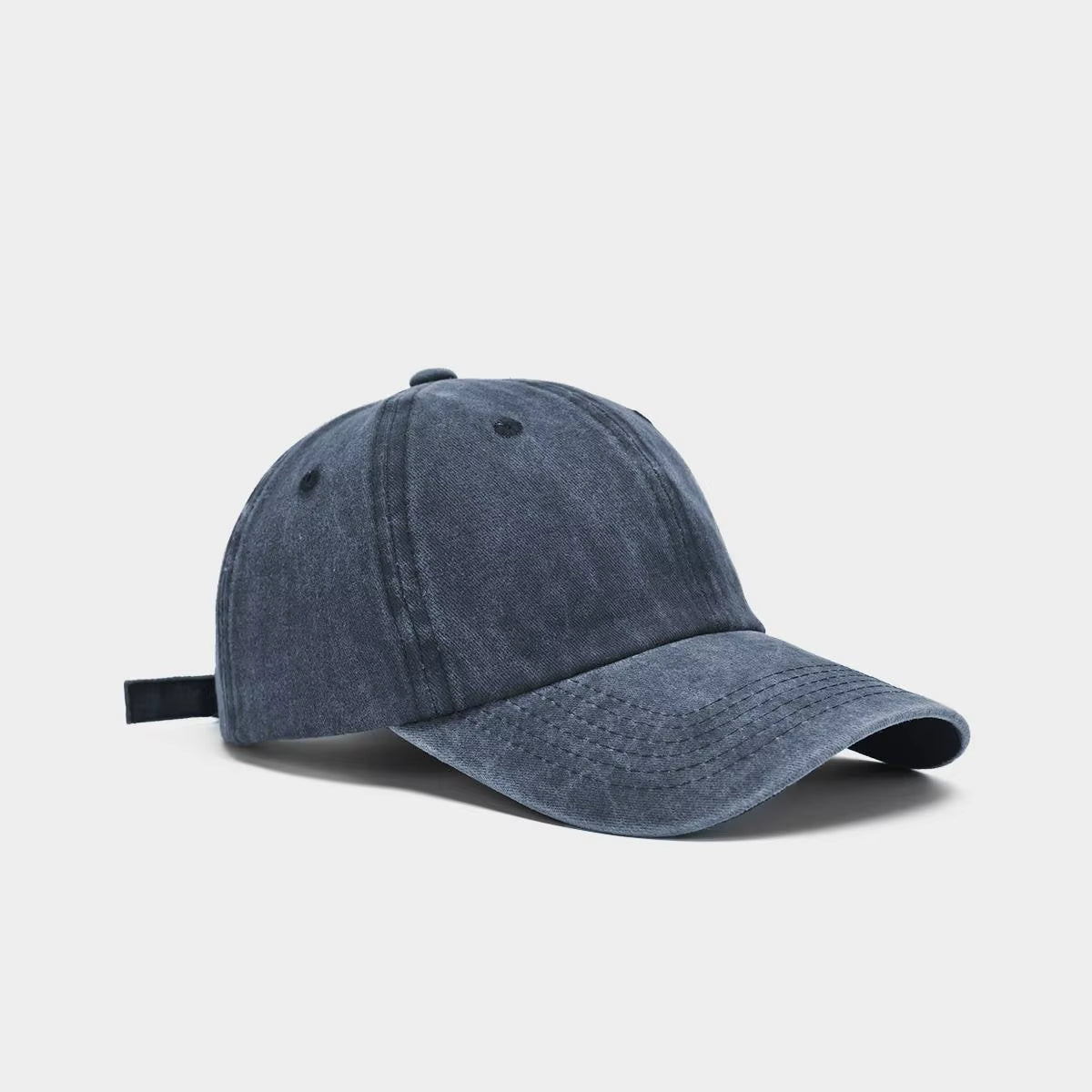 Washed cotton unisex baseball cap in heritage style with low-profile fit and adjustable strap