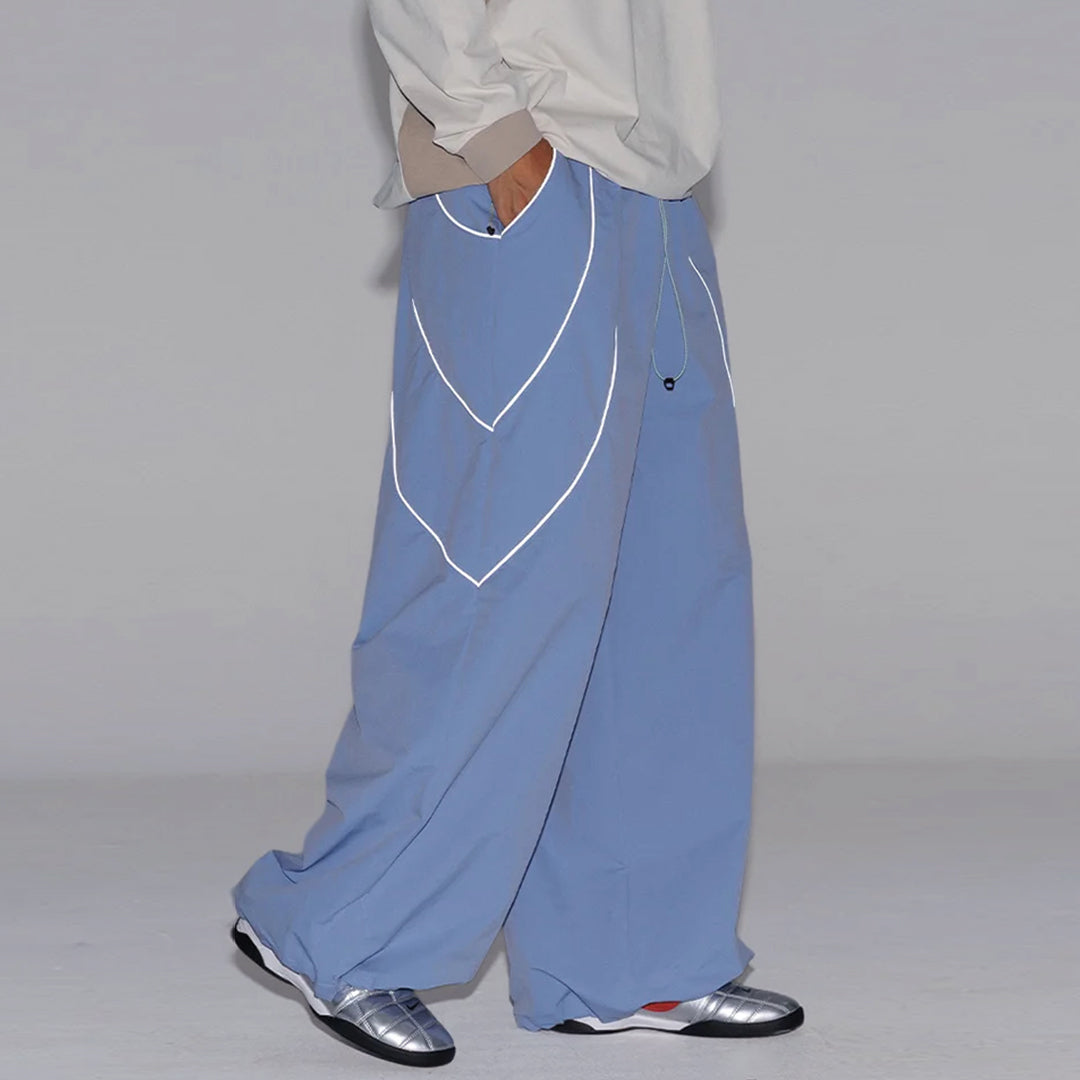 Black wide-leg reflective trousers water-resistant nylon urban outdoor performance pants with side stripe
