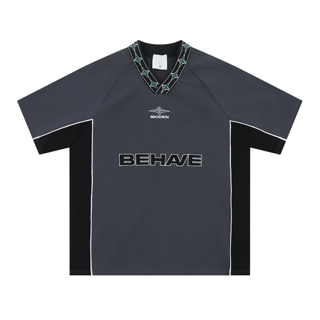Loose fit retro cotton jersey tee with bold embroidered chest lettering in streetwear style