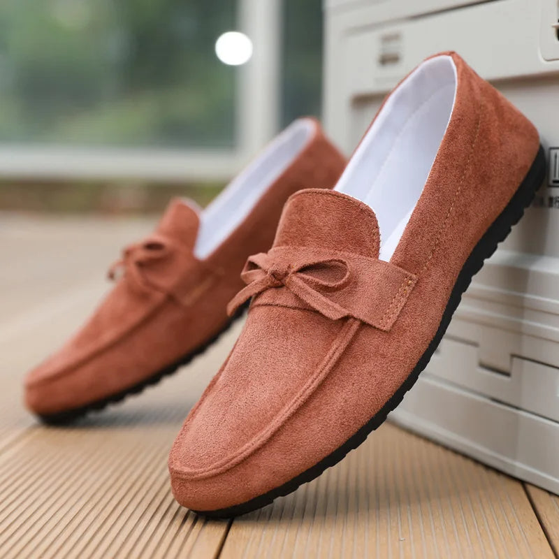 Women's suede bow loafers slip-on style with anti-slip rubber sole in neutral casual cut