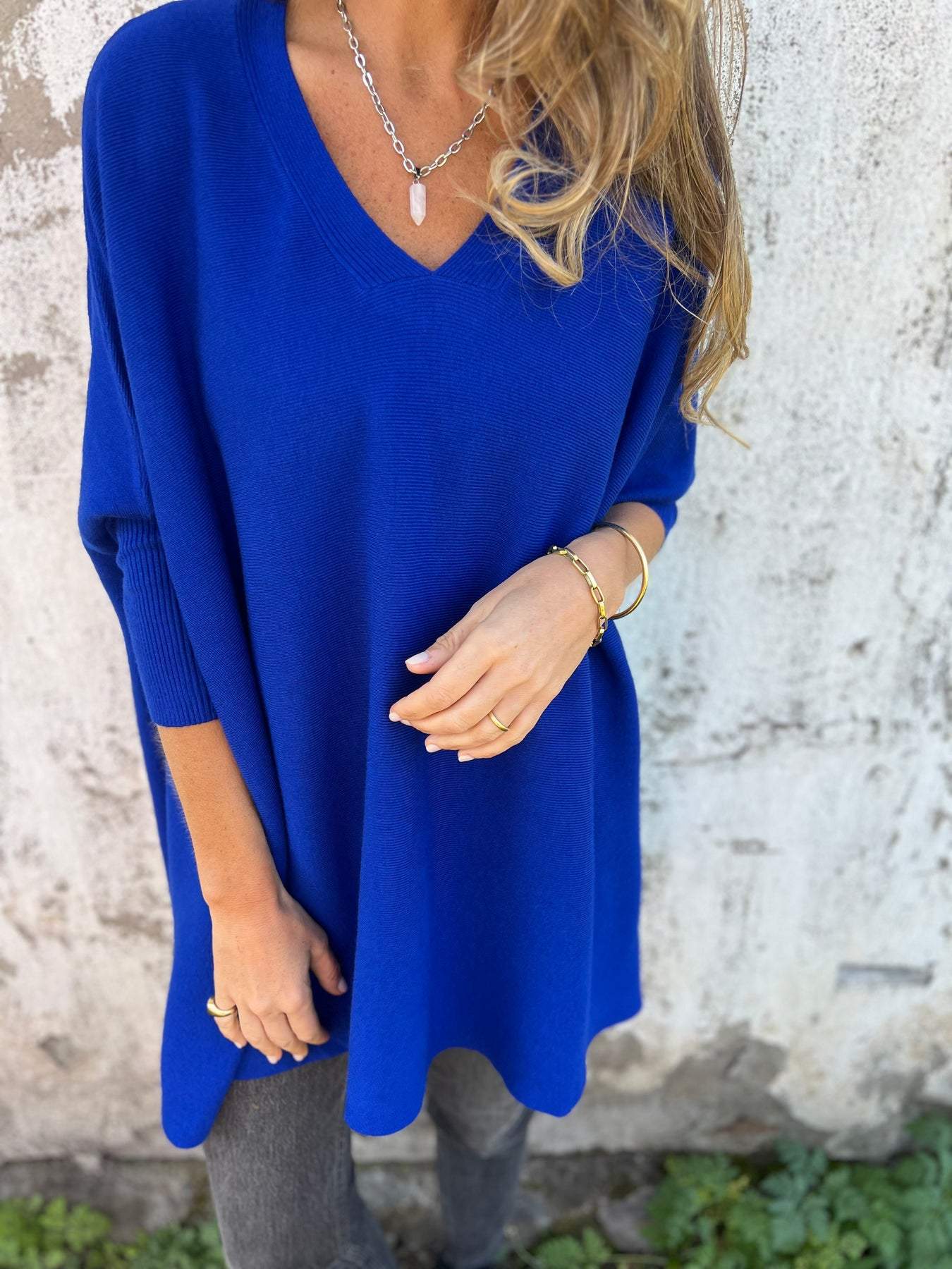 Women's relaxed V-neck winter sweater soft modern silhouette cozy everyday layering piece