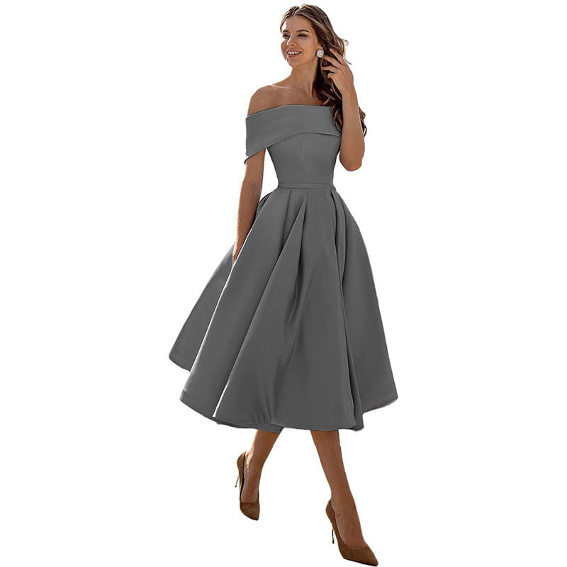Women's black strapless flared evening dress with flowing silhouette for elegant summer occasions