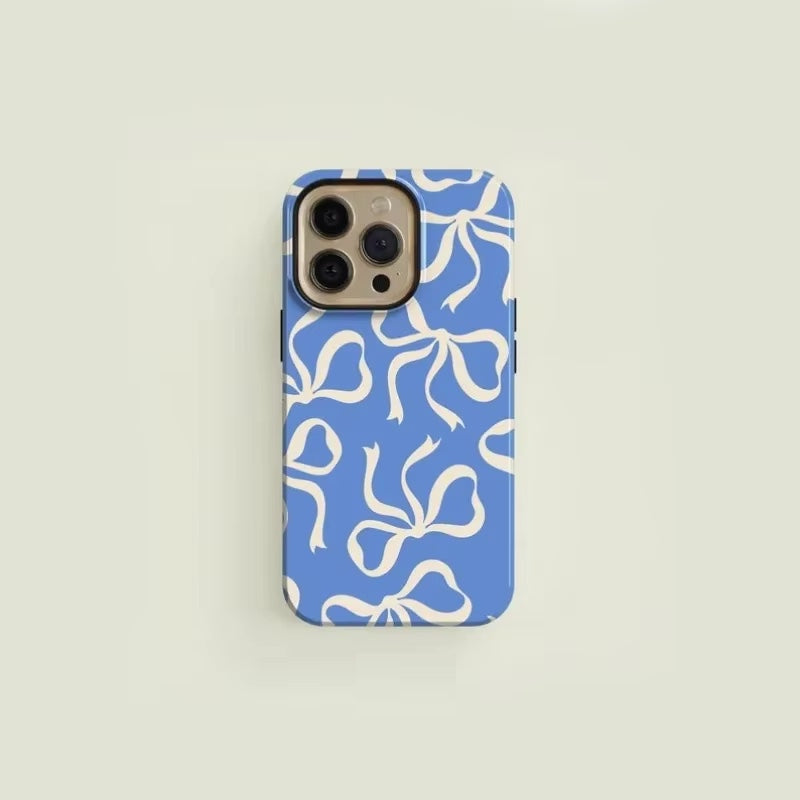 Black bow-pattern iPhone case slim glossy finish elegant couture design robust protection for style enthusiasts