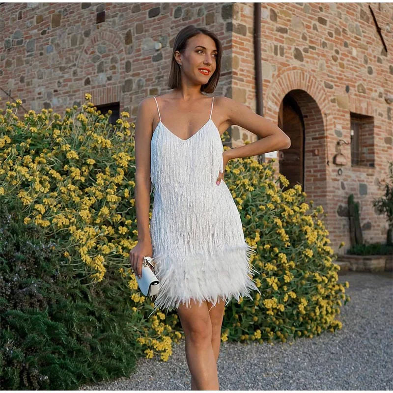 Nicolette glamorous tassel sequin feather fashion accessory with shimmer texture and movement detailing