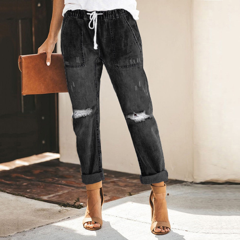 Women's relaxed-fit casual pants with elastic waistband in neutral tone for everyday comfort