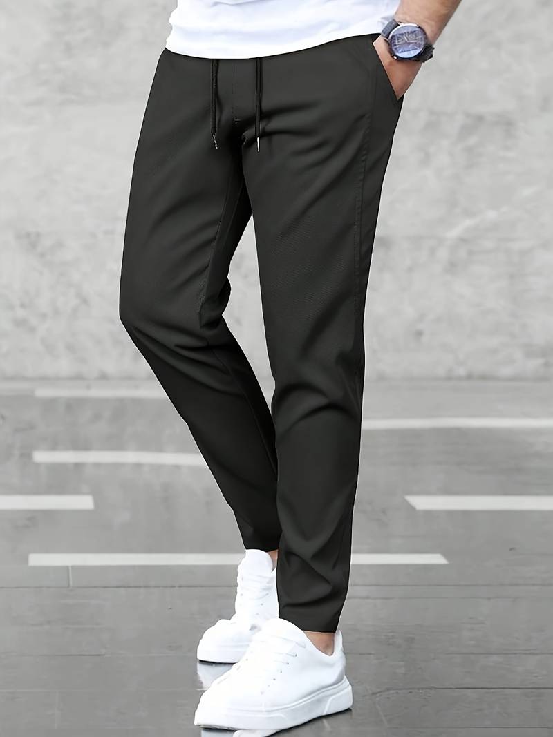 Men's gray loose fit drawstring joggers with adjustable elastic waist for all-day comfort