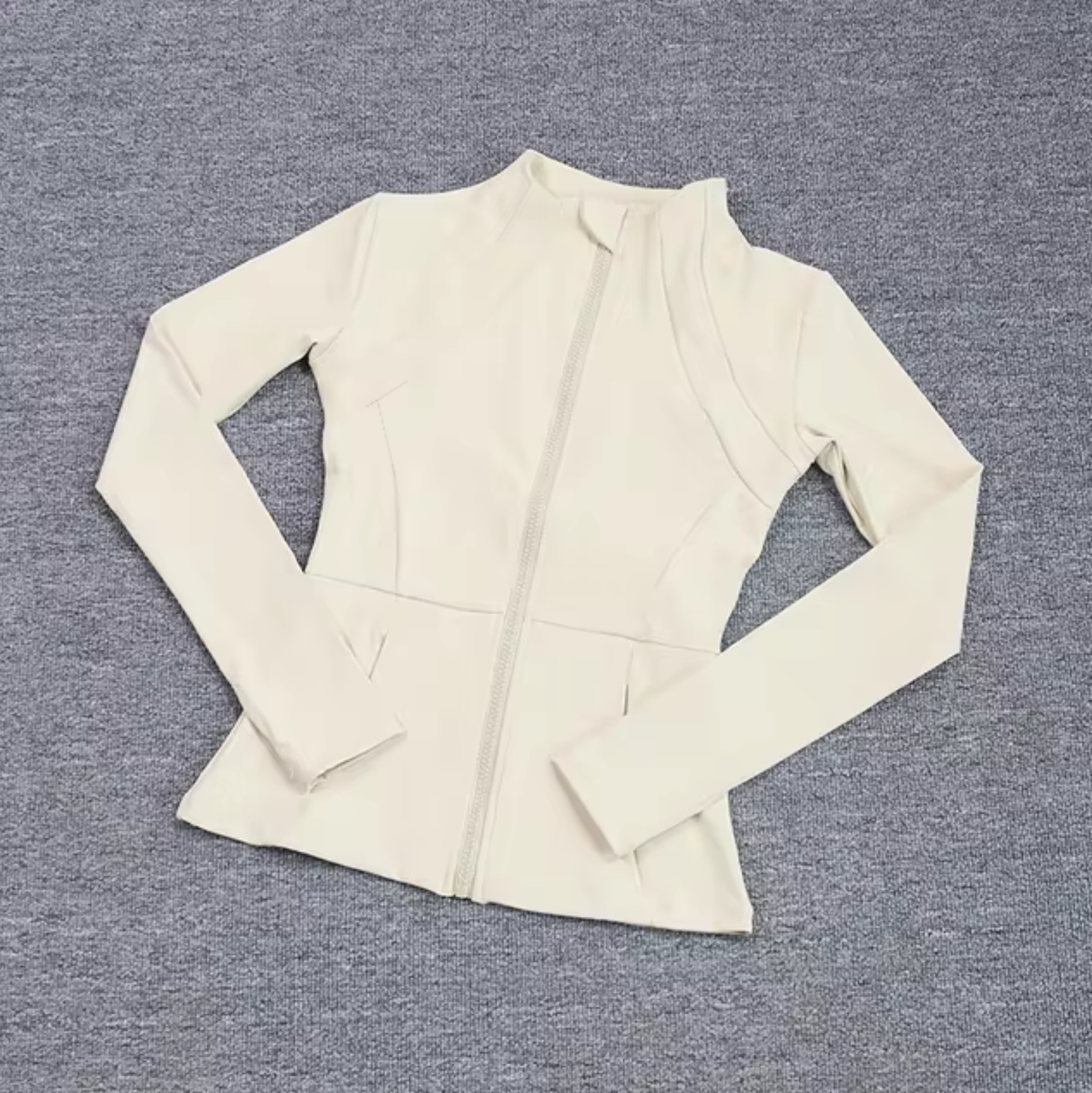 Women's fitted zip sports jacket in sleek design with flexible fabric for active training and freedom of movement