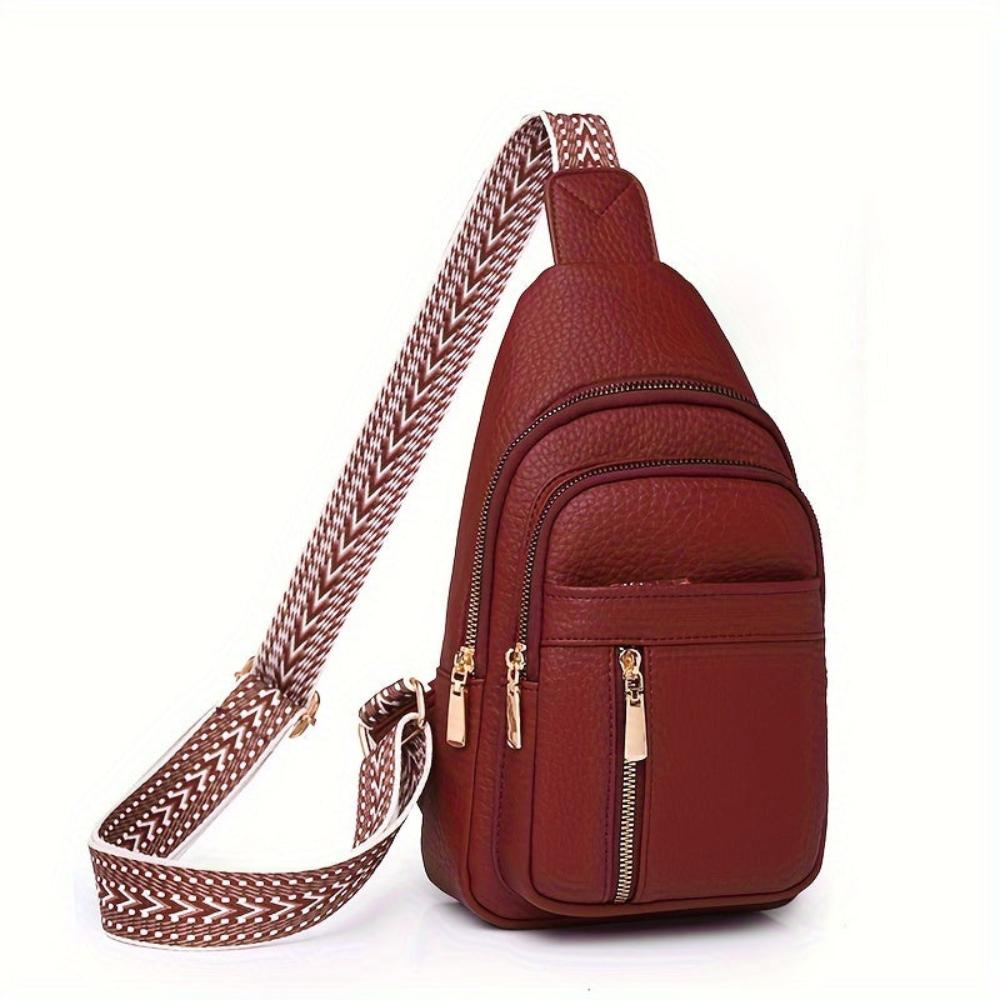 Elise black grain vegan leather women's crossbody bag with top zip closure, compact and elegantly structured