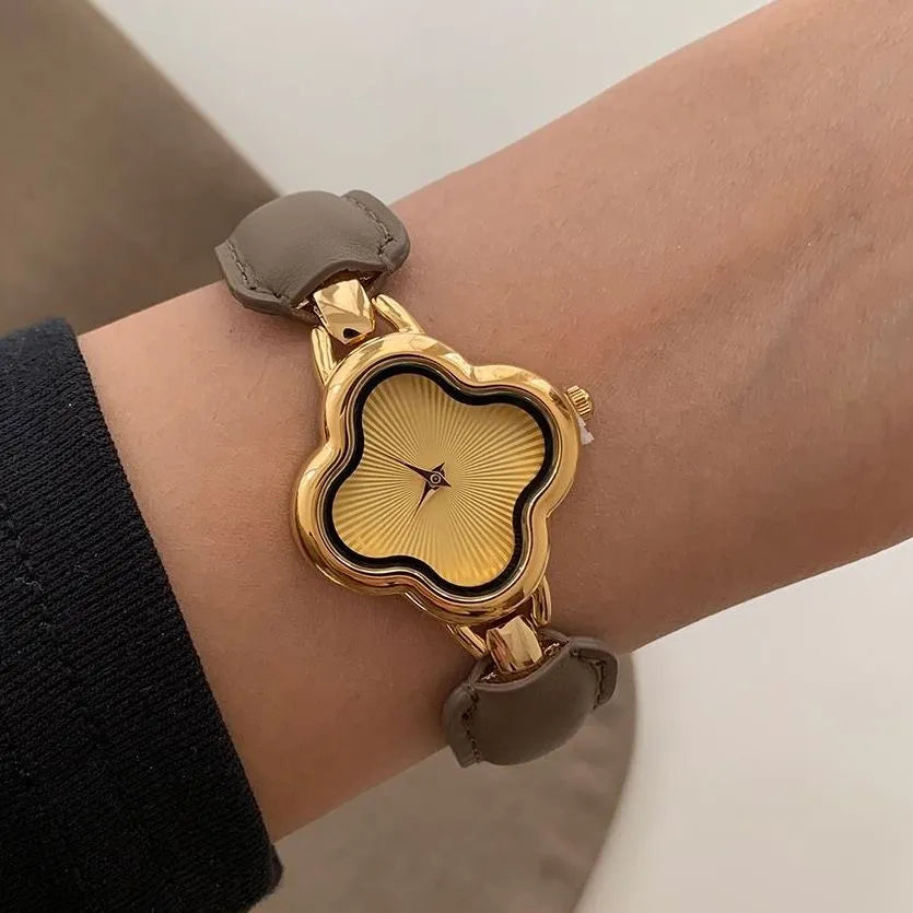 Regalia unisex watch gold-plated case genuine leather strap four-leaf elegant timepiece