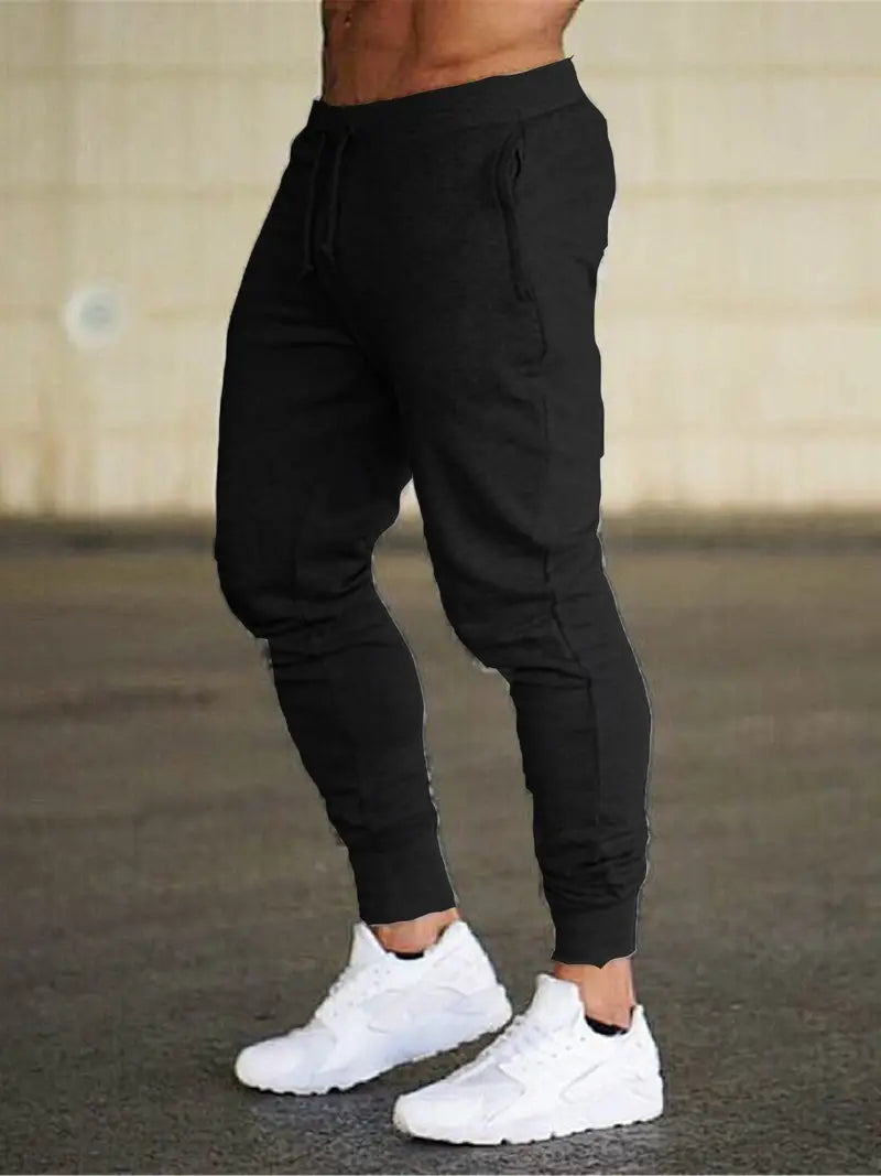 Men's casual drawstring active fit pants in neutral tone with elastic waistband for everyday comfort