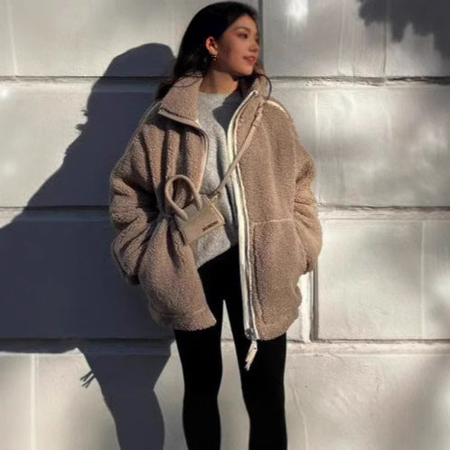 Oversized teddy fleece jacket in neutral tone, relaxed cozy winter fit with plush texture